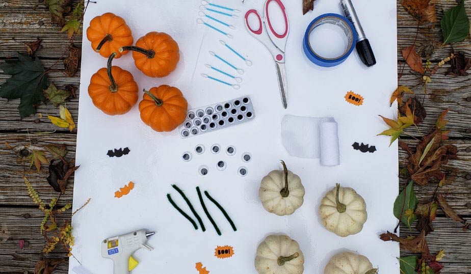 flat lay of the supplies for Halloween tic-tac-toe: mummies vs. monsters diy activity for kids